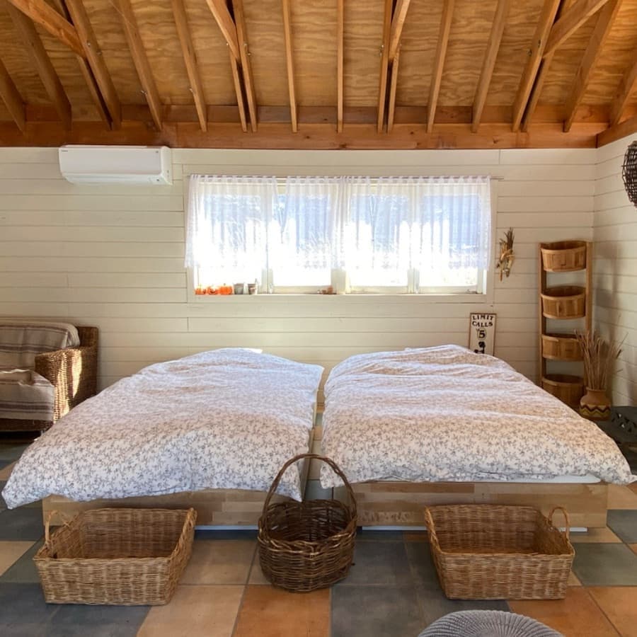 山中湖のコテージGARDENSHED、Montanaのベッド